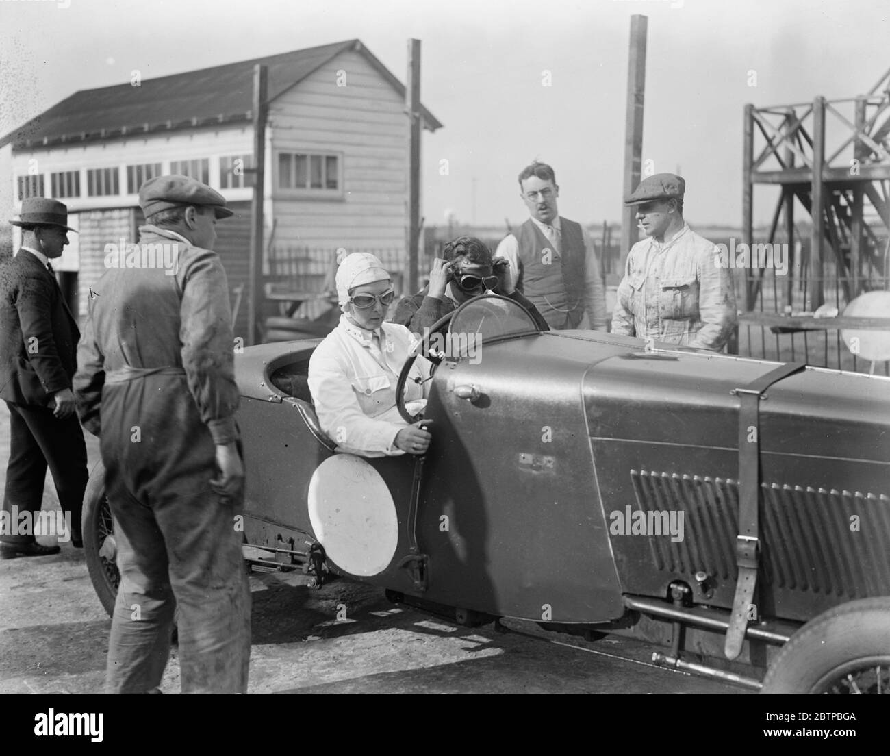 Speed bid . The Honourable Mrs Joan Chetwynd attempts to break 12 hours speed record ( 967 miles at 81.3 mph ) for light cars at Brooklands . 30 September 1929 Stock Photo