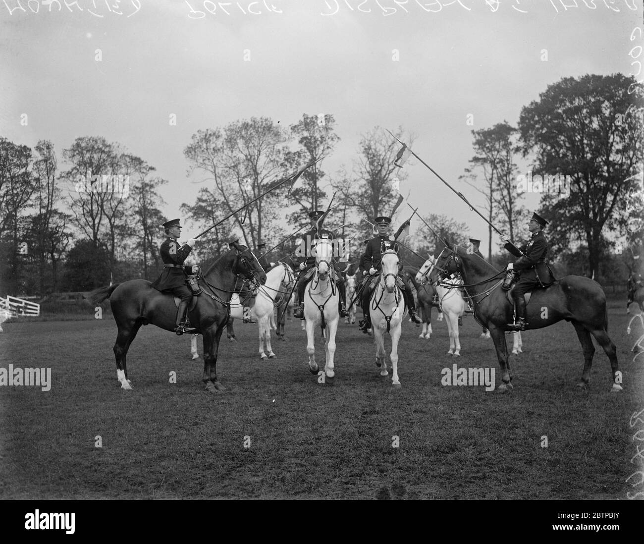 Mouned police display . Mounted police rehearsals for forthcoming displays took place at Imber Court . The Avenue during the musical ride . 23 May 1930 Stock Photo