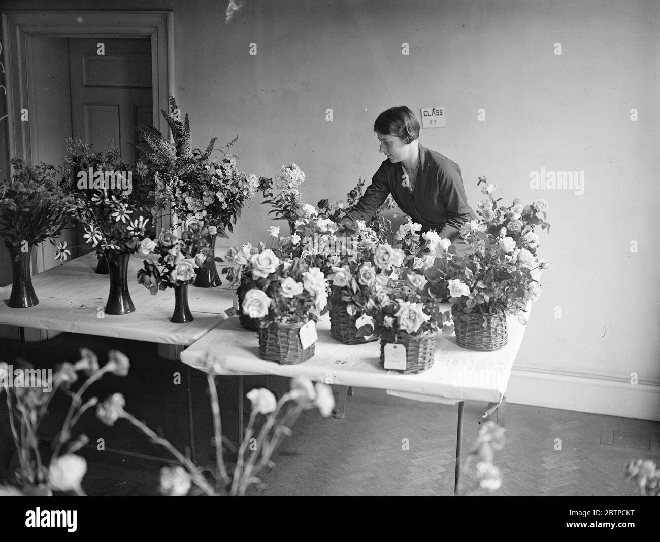 Beauty among the roses . One of the many beautiful exhibits at the Port of London Authority Flower Show which opened at the PLA Building on Monday . 25 July 1932 Stock Photo