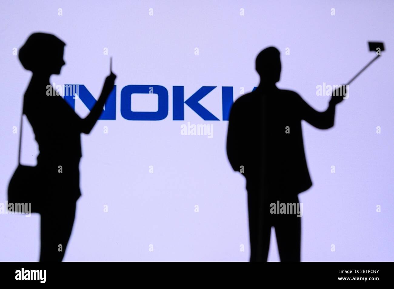NEW YORK, USA, 25. MAY 2020: Nokia a Finnish telecommunications, technology, and electronics company Man and Woman taking a photo on mobile man use se Stock Photo
