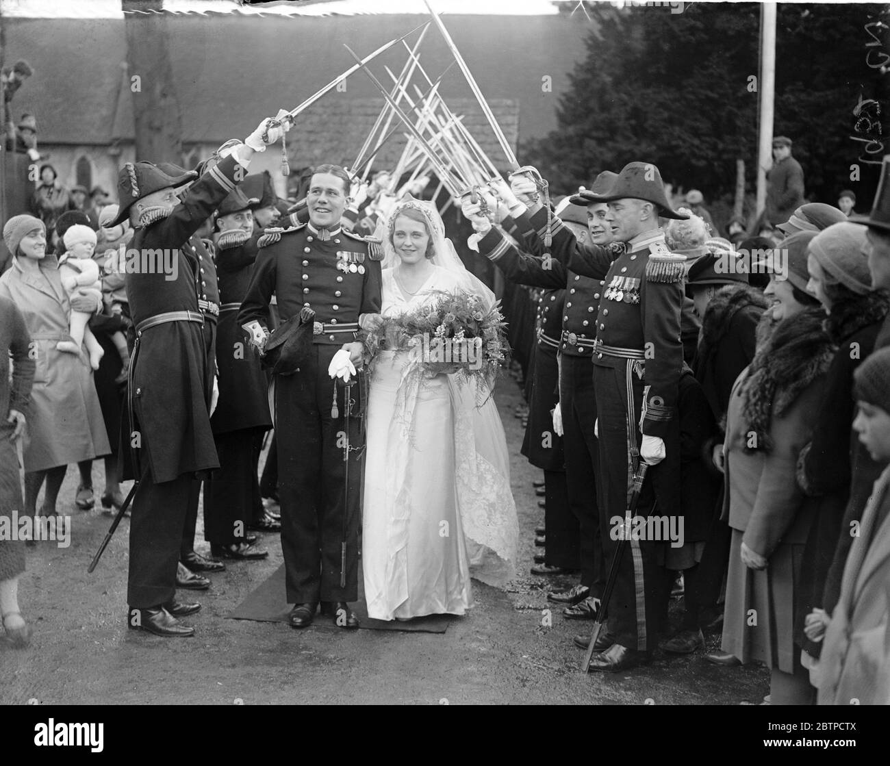 Naval wedding at Yateley . Lt Com W Wilmot Sitwell of HMS Hood and Miss Nancy Ferguson . 26 November 1932 Stock Photo