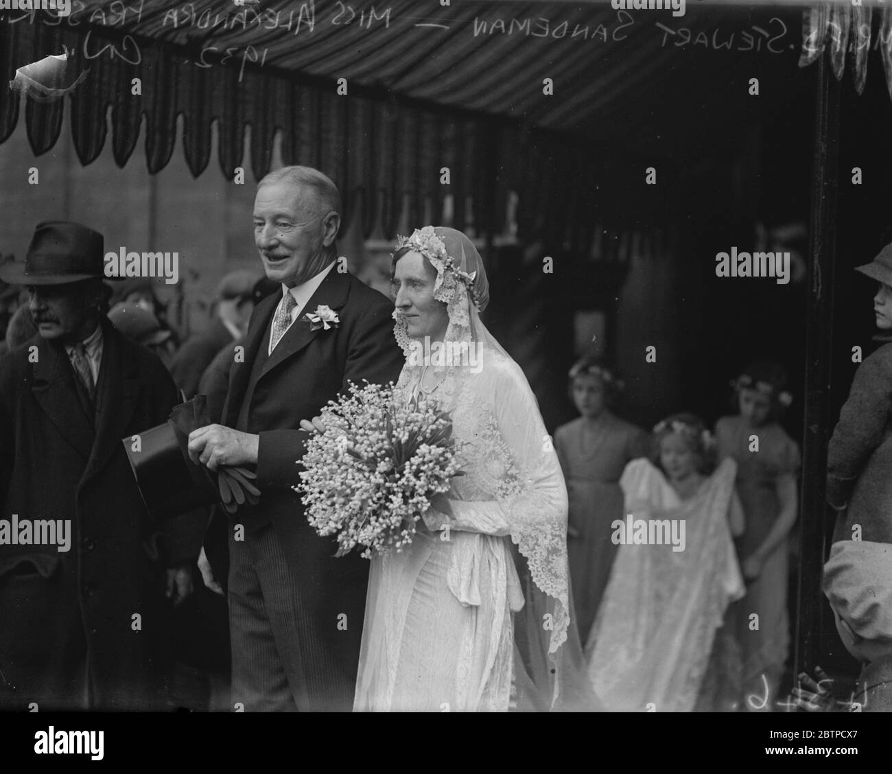 Society wedding . The marriage between Mr F D Stewart Sandeman and Miss Alexandra Fraser , took place on Wednesday , at All Saints Ennismore Gardens . Bride and bridegroom . 23 November 1932 Stock Photo