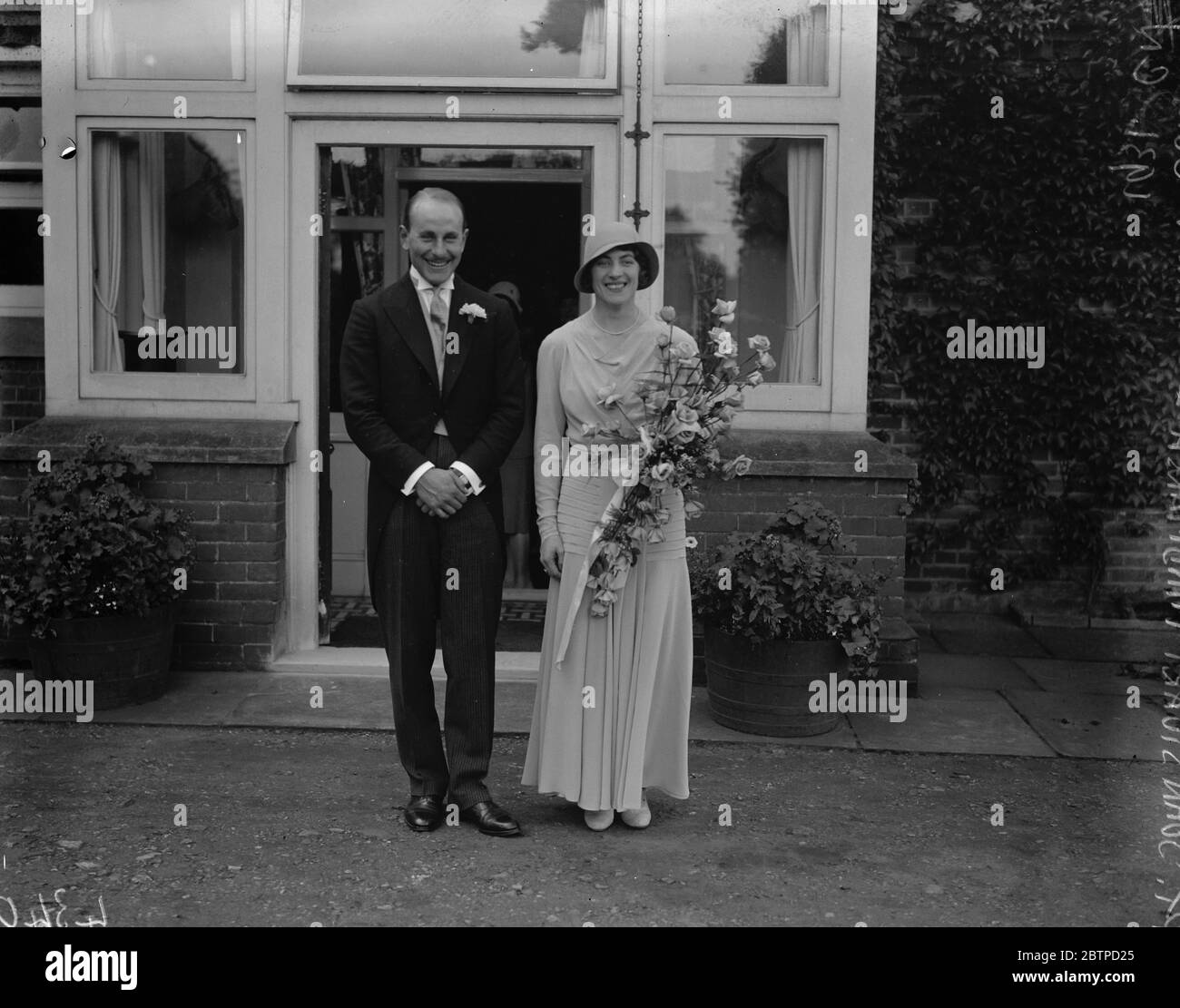 Famous woman motorist Wednesday . The marriage in the little village church of Stoke D ' Anernon Cobham , Surrey , of Miss Violette Cordrey and Captain John Stuart Hindmarsh . The bride and bridegroom . 15 September 1931 Stock Photo