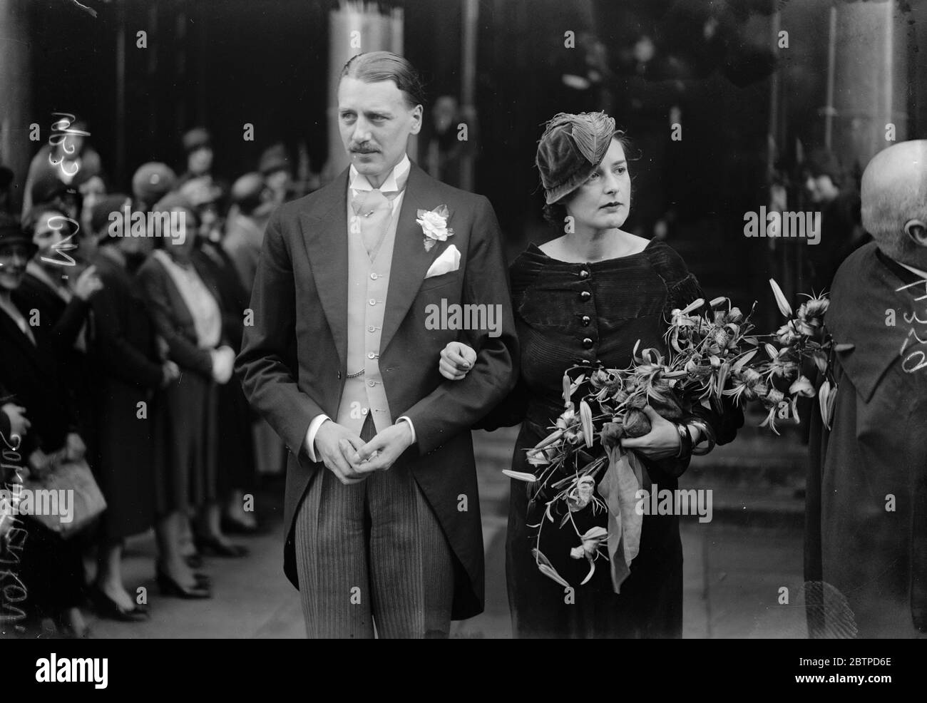 Baron weds . The marriage between Baron Stackelberg and Mme Madeleine Soldatenkov at St Columba 's , Pont Street . Bride and bridegroom . 10 October 1933 Stock Photo