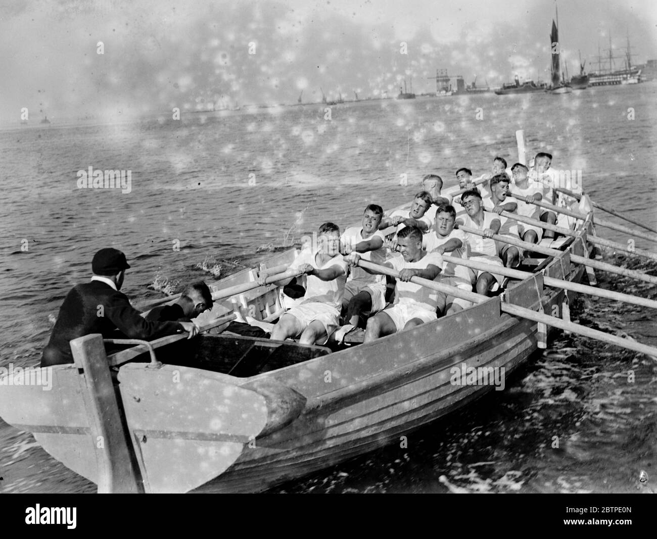 Boys rowing . 1935 . Stock Photo