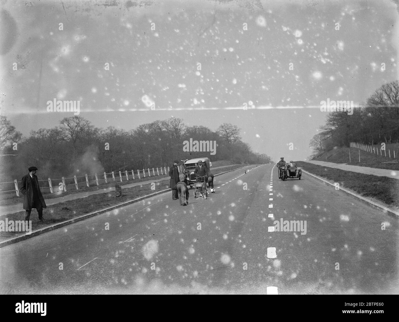 Painting white lines . 1935 Stock Photo Alamy