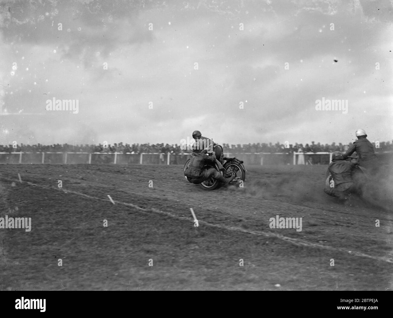 Motorcyle race with sidecars . 1935 . Stock Photo
