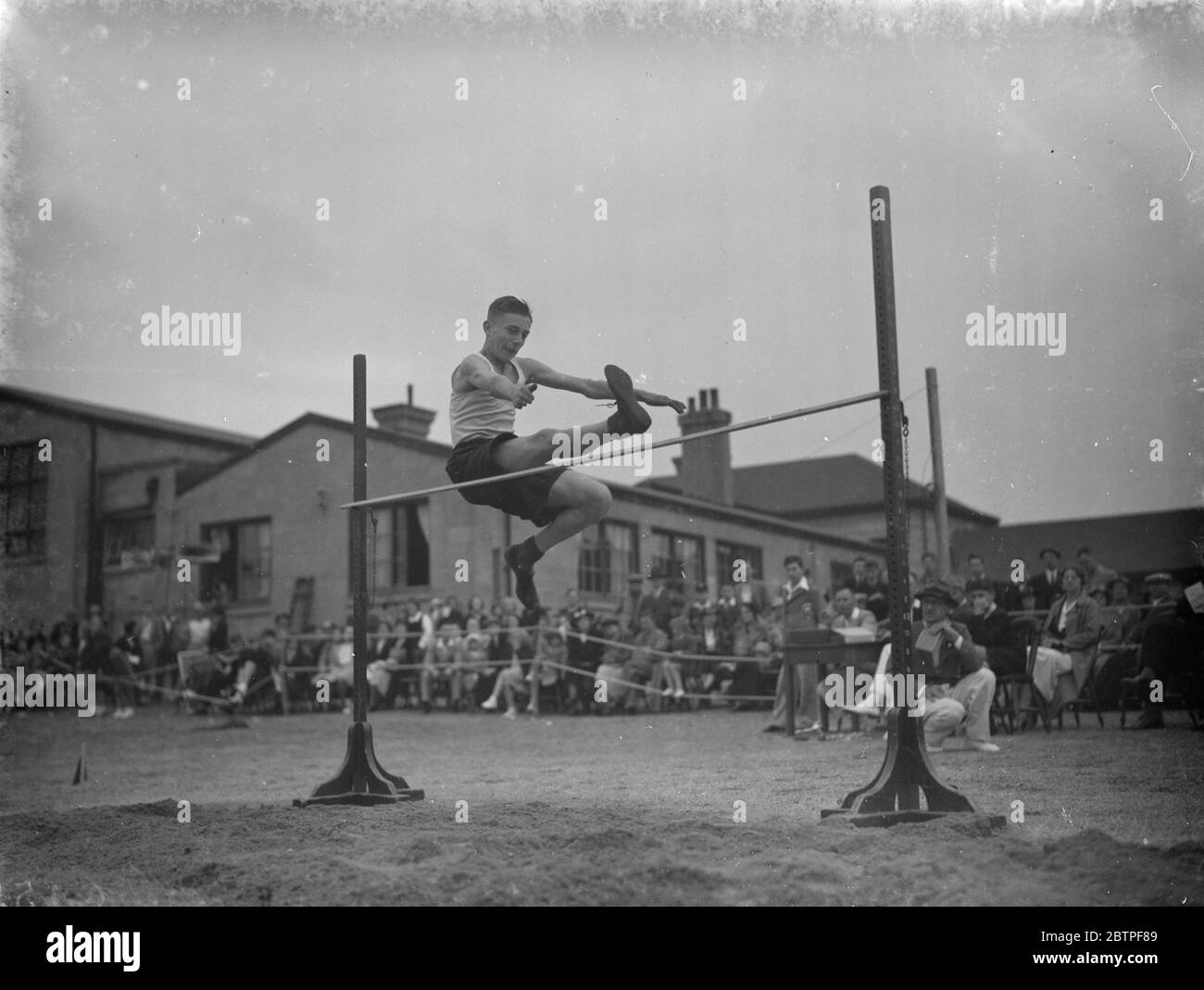 Sport at school . The high jump . 1938 Stock Photo Alamy