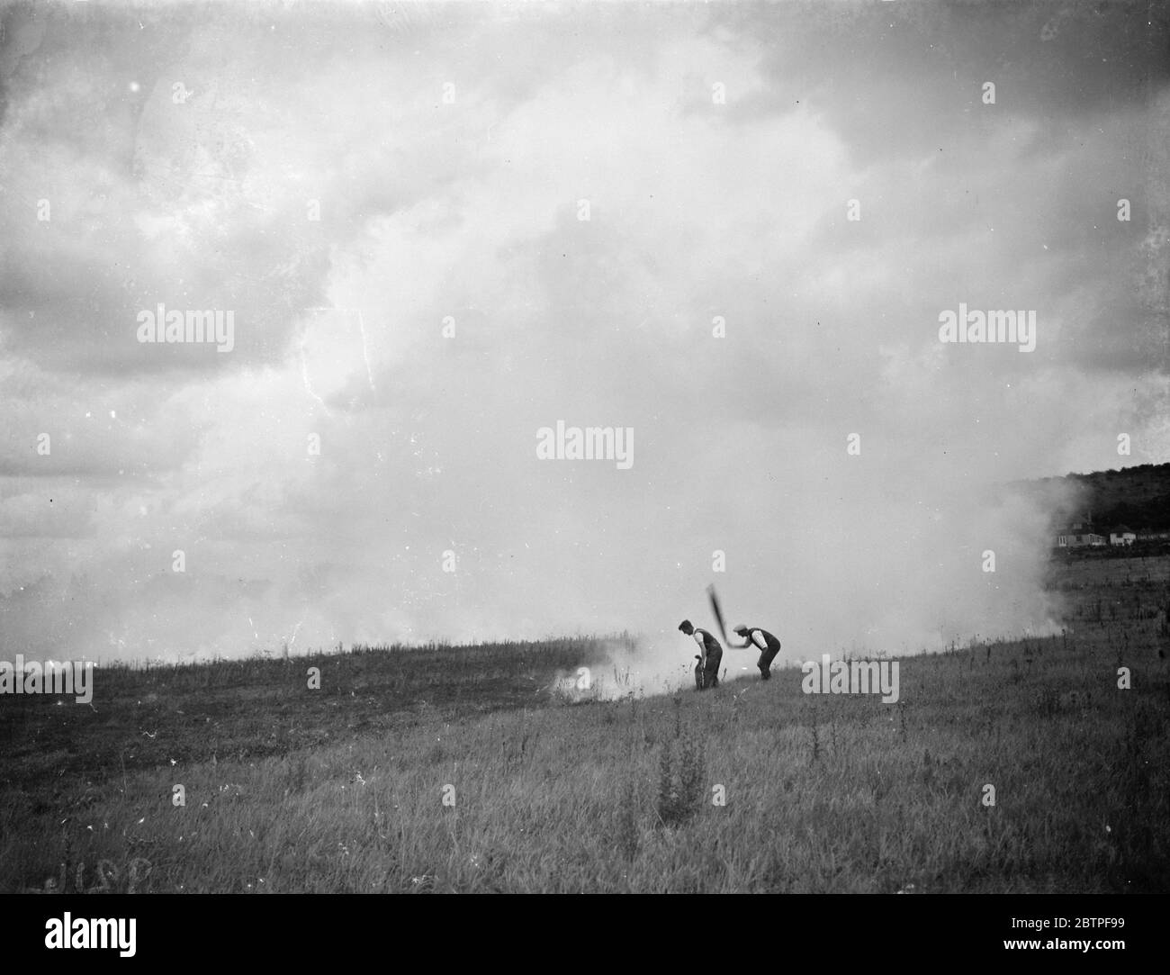 Burning grass in Otford . 1938 Stock Photo