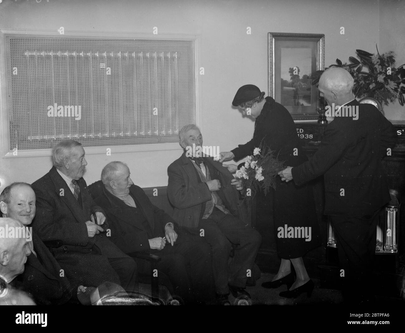 The Dartford Veterans club . Mrs M W Renton is introduced to the members . 1938 Stock Photo