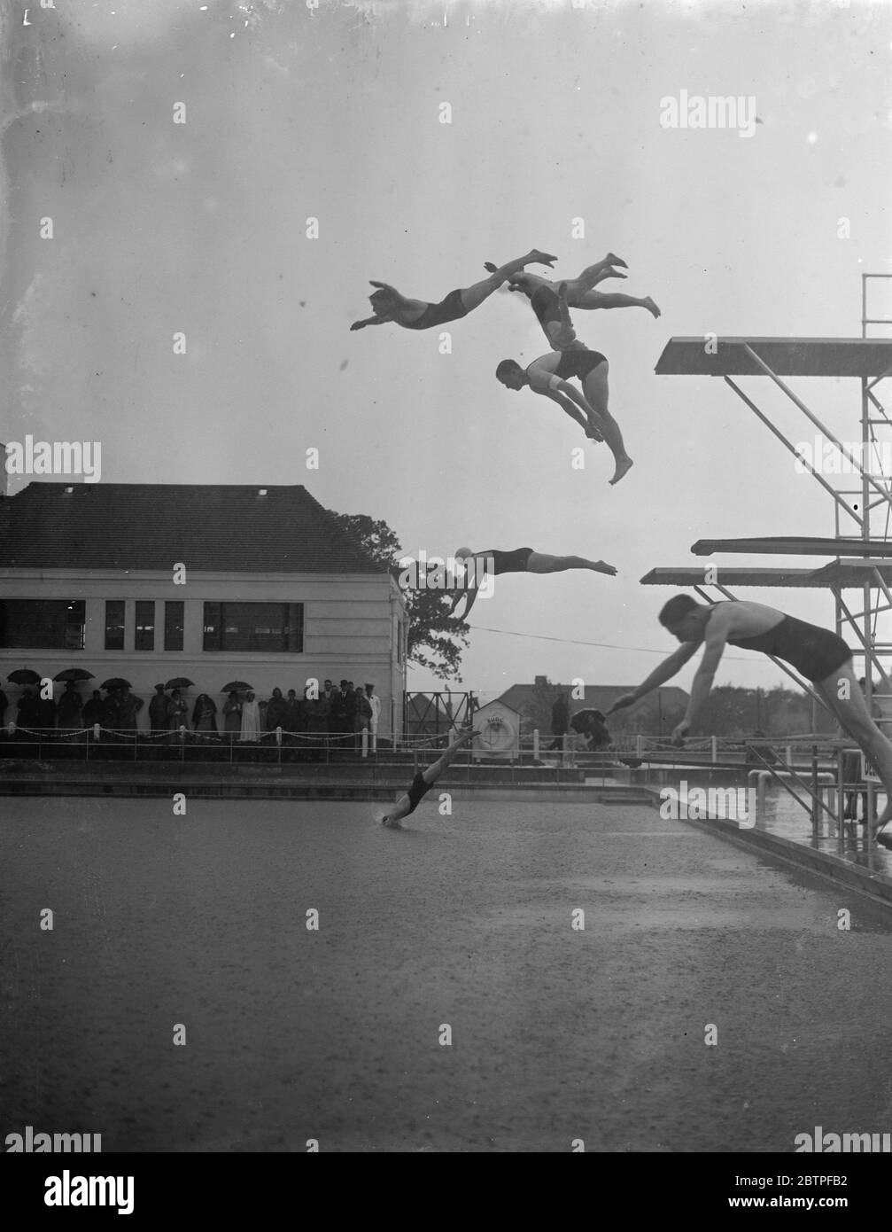 Bexleyheath swimming baths open . Diving display from the diving boards