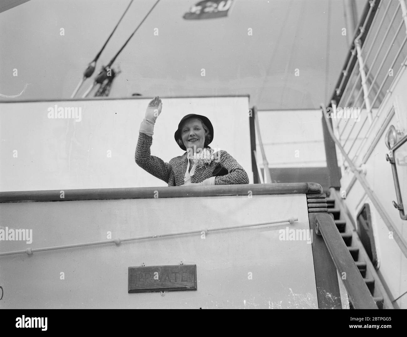 June returns to England . June , the noted actress , who was recently divorced from Lord Inverclyde of Nevada , a divorce not recognised in England , has returned to England to reappear once more on the stage here . June waving her greeting to England on arrival at Southampton aboard the liner Mapress of Britain . 15 April 1932 . Stock Photo