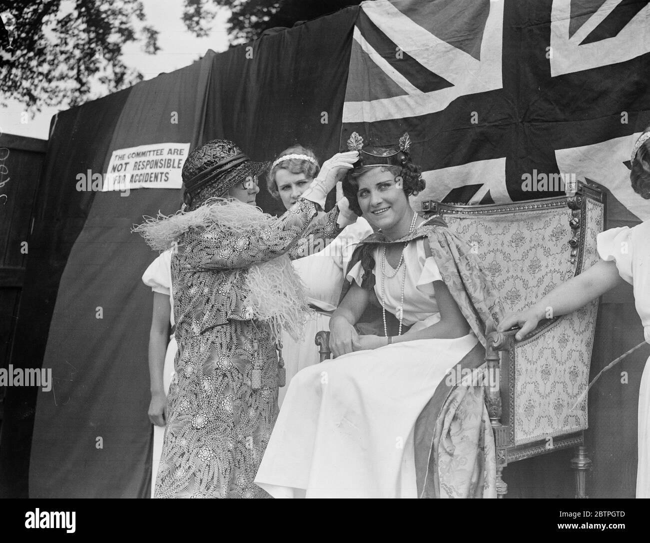 Romford carnival queen crowned . Miss Dora Jeffreys , was crowned Queen of the Romeford Carnival , held in aid of the Victoria Hospital at Swan Meadow Romford , Essex . Miss Dora JJeffreys being crowned Queen of the Carnival at Romford . 16 July 1932 Stock Photo