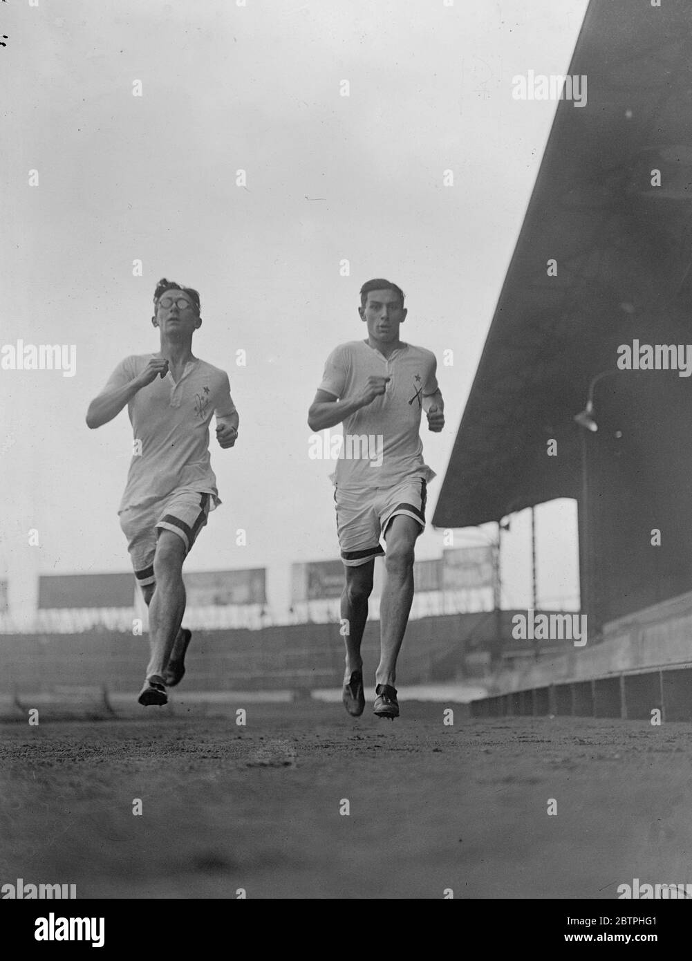 Well off the ground . Public schoolboys prepare for great annual athletic meeting . Public schoolboys throughout the country are preparing for the great annual athletic meeting for the public schools , Challenge cup at Stamford Bridge this week . M J K Sullivan , miler , and P B Edmunds , half miler , both of Shrewsbury School in fine action during practice at Stamford Bridge for the event . Both of them have both feet off the ground . 30 March 1932 Stock Photo