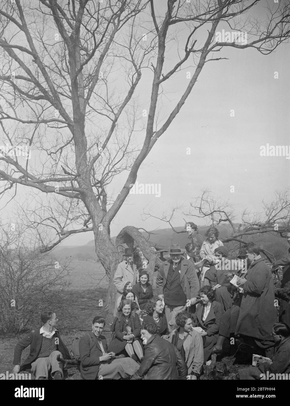 Hikers Mystery Express . Hikers from Mystery Express start ramble at Pangbourne . Hundreds of hikers who set out from London in a  Hikers Mystery Express  which left Paddington for an unknown destination , left the train at Pangbourne , Berkshire , for a ramble in the sunshine . The long line of hikers in the sunshine along the river path at Pangbourne . 25 March 1932 Stock Photo