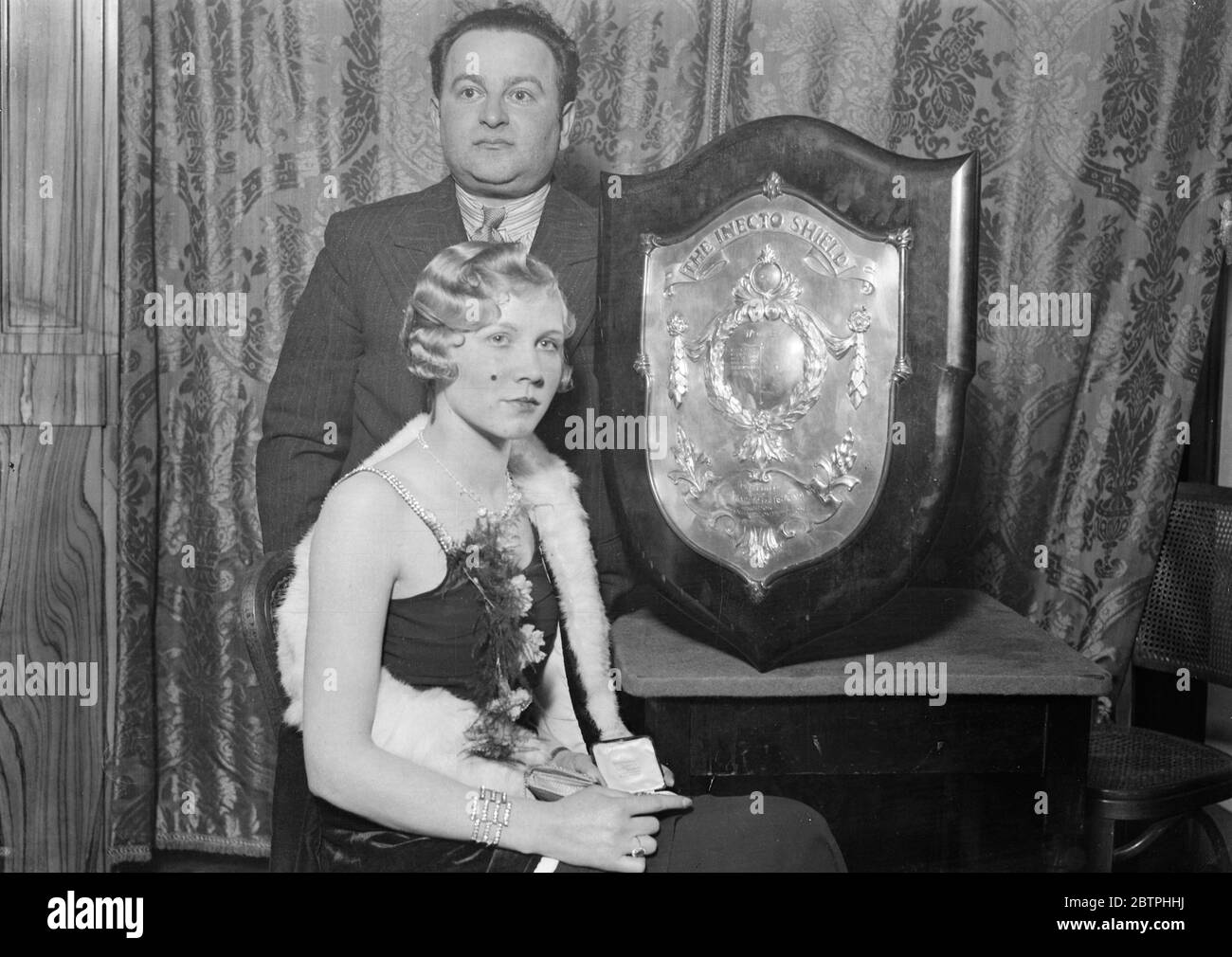 Champion hairdresser Mr Alfred Balbus was judged the champion man hairdresser and Miss Annette Ost the champion lady hairdresser at a contest for spring fashions at the Lyons House ,