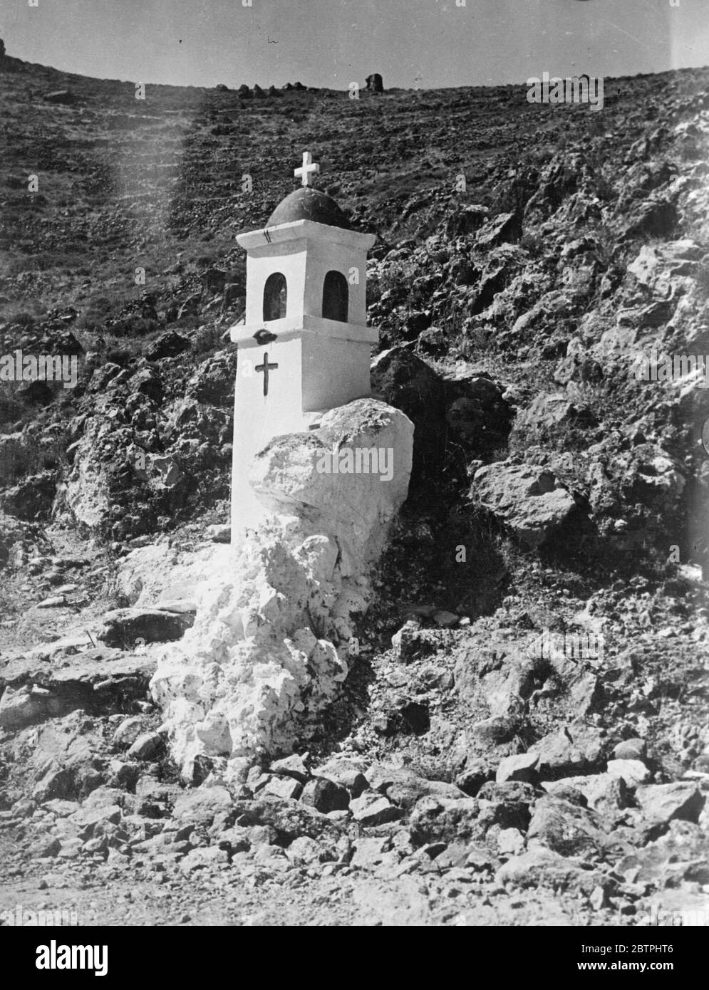 Greece . Aegina . This might be called the  smallest  church on the Island of Aegina , were it not for the fact there are six more exactly like it on this same hillside . They are not only the smallest on the Island , but probably the smallest to be found anywhere . 1933 Stock Photo
