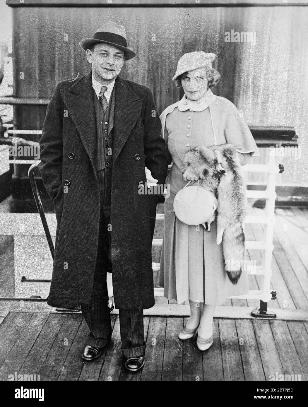 Marcel Wallenstein and wife . September 1934 Marcel H. Wallenstein, operator of Planet News. London photographic agency Stock Photo