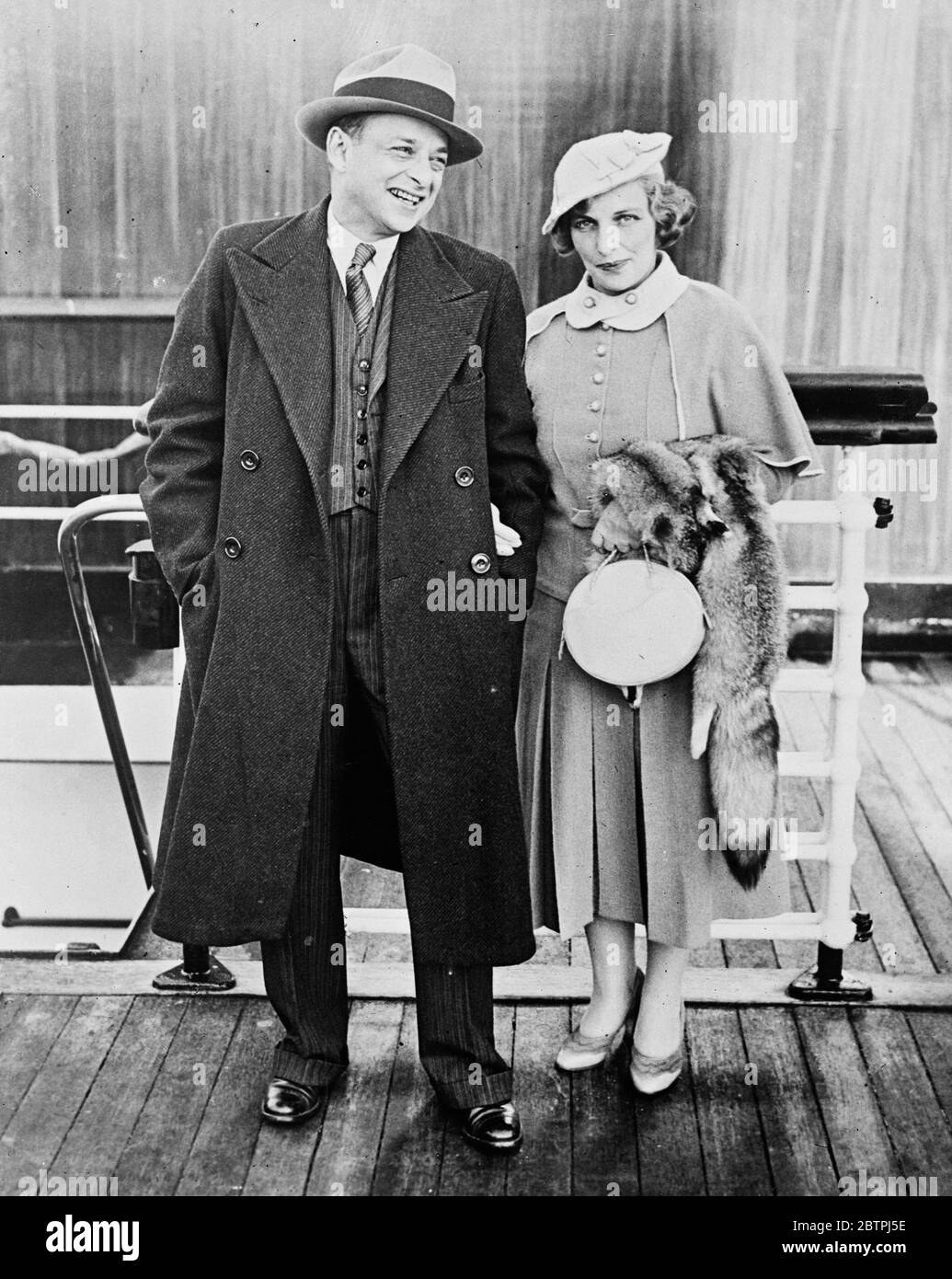 Marcel Wallenstein and wife . September 1934 Marcel H. Wallenstein, operator of Planet News. London photographic agency Stock Photo