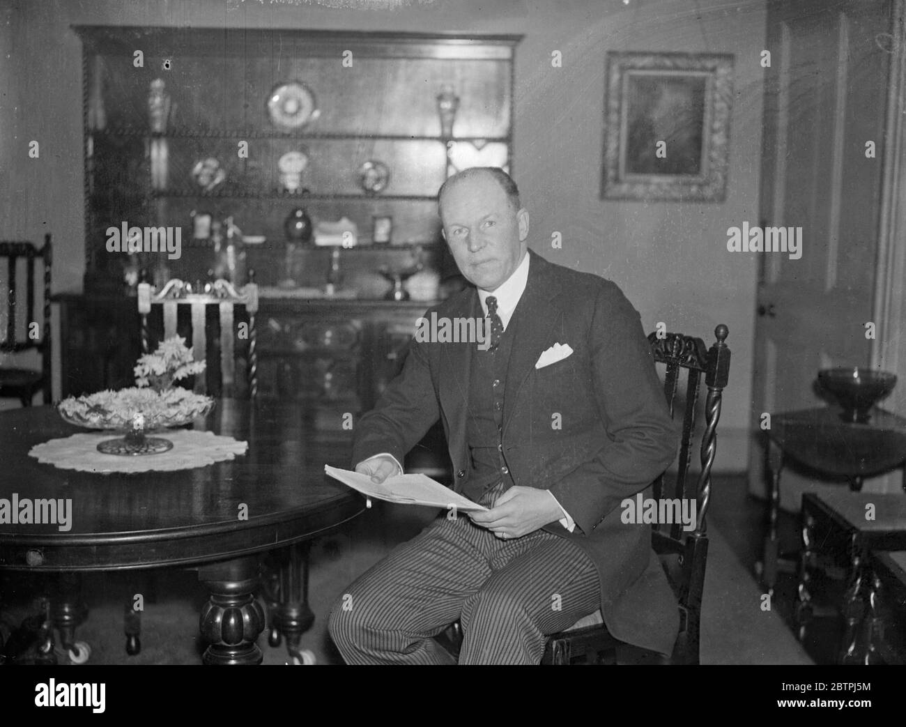 New Metropolitan magistrates . Sir Gervais Rentoul , K C , MP , has been appointed , with Mr Geoffrey Keith Rose , the barrister , as a Metropolitan Magistrate to fill the vacancies caused by the death of Mr J A R Cairns and the retirement of Mr Frederick Mead . Photo shows ; Sir Gervais Rentoul reading the news of his appointment in his London home . 3 January 1934 Stock Photo