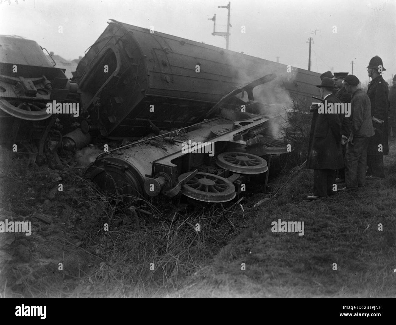 Train Crash . A view of the rail disaster . 2 killed and many injured in London express train smash with a lorry on a level crossing at Wharf Road . 27 November 1934 Stock Photo