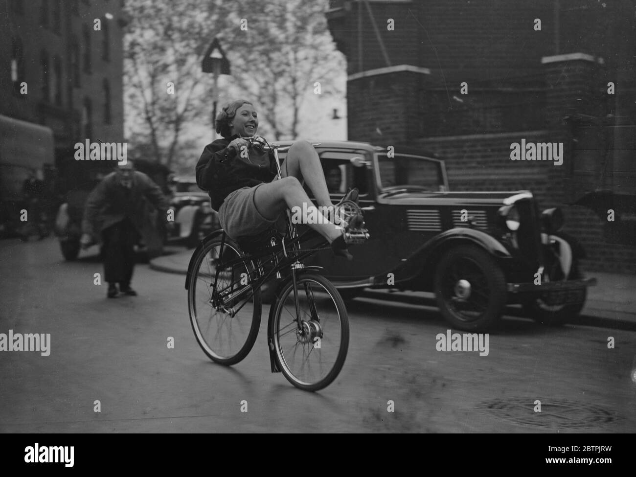 Cycling lying down . A cycloratio . 25 October 1935 Stock Photo