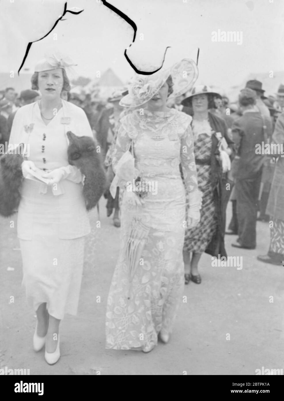 The biggest at Ascot . An outsized hat worn by a women racegoer as she left Waterloo for Ascot . 19 June 1935 Stock Photo