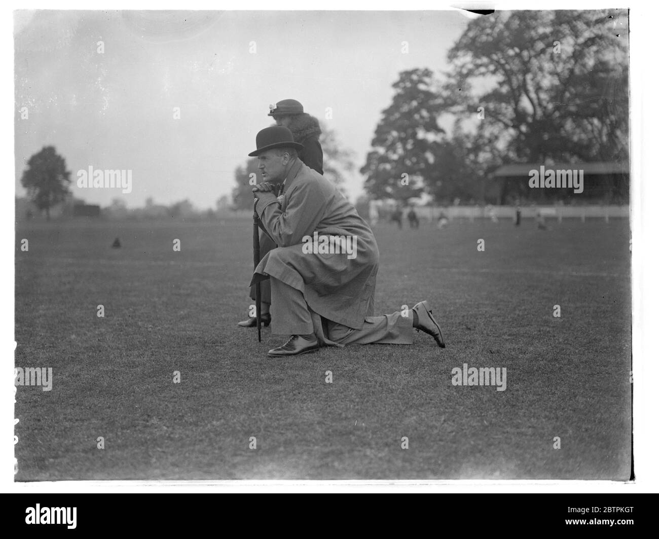 Sir Percy Concentrates Colonel Sir Percy Laurie was an engrossed spectator at the City and Hospitals Charity Contest held on the Metropolitan Police Athletic Association ground at Imber Court , East Molesey Photo shows Colonel Sir Percy Laurie watching the racing with rept attention . 23 May 1936 Stock Photo