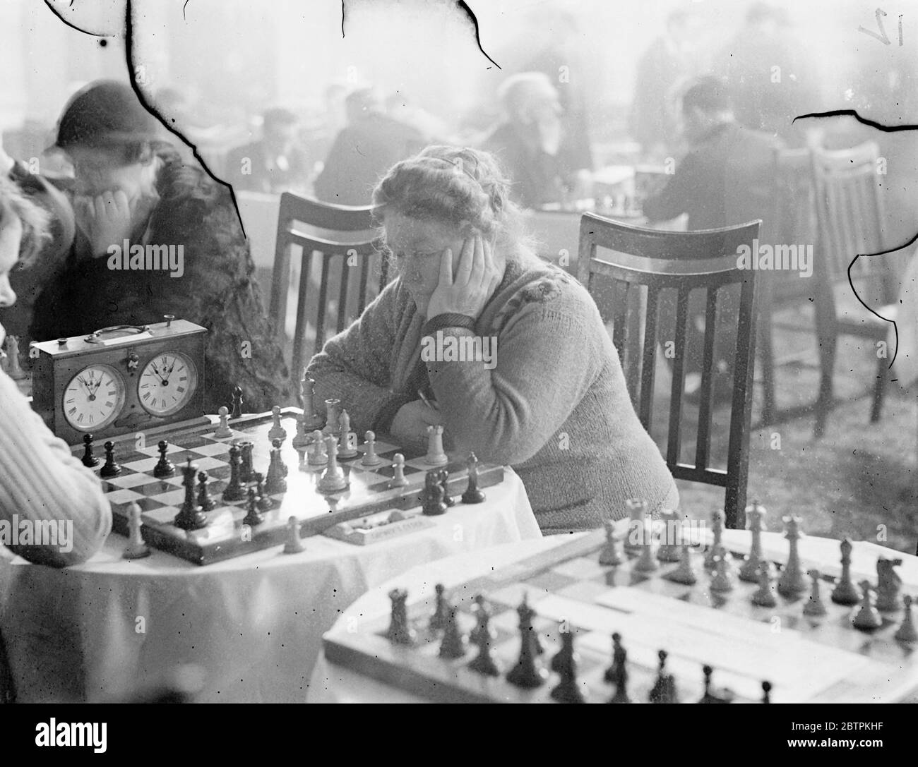 Lost in her game . Chess champions from every part of the world are  competing in the second annual Chess Congress which has opened at the Grand  Hotel , Margate . One