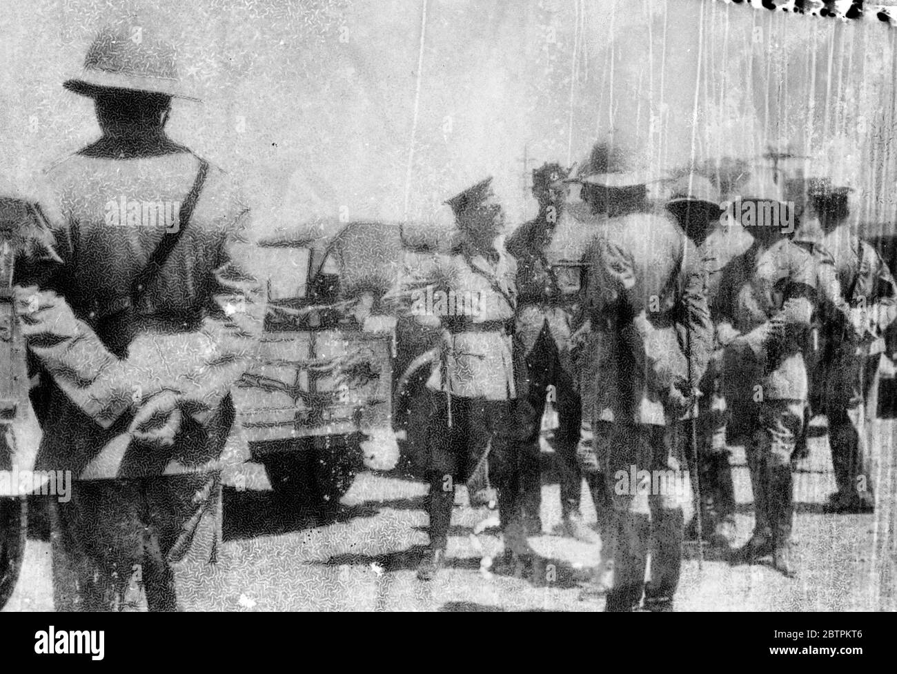 British High Commissioner Inspects Reinforcements In Palestine . Sir Arthur Wauchope , the High Commissioner for Palestine , inspecting the 8th Hussars Regiment in Talaverra Barracks , near Jerusalem after their arrival from Egypt to reinforce the troops which are combating the Arab reign of terror . The High Commissioner spoke to the Hussars and advised them on their duties in the more dangerous parts of the country . Photo shows : Sir Arthur Wauchope , the High Commissioner ( peaked cap ) talking with officers at the inspection . 7 Jul 1936 Stock Photo