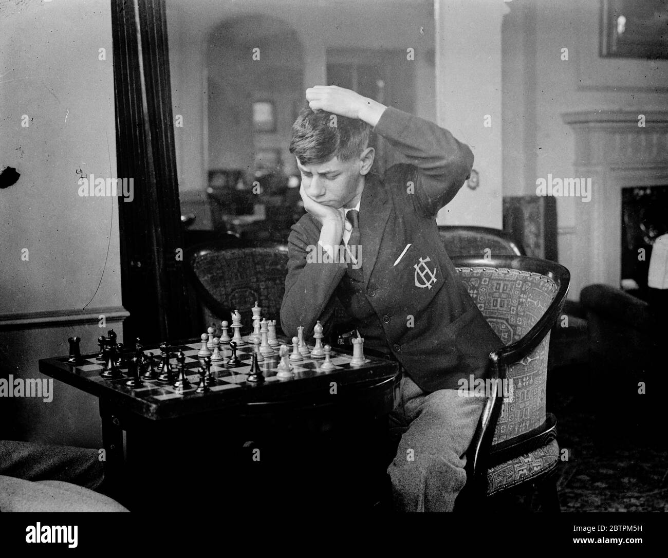 Lost in her game . Chess champions from every part of the world are  competing in the second annual Chess Congress which has opened at the Grand  Hotel , Margate . One