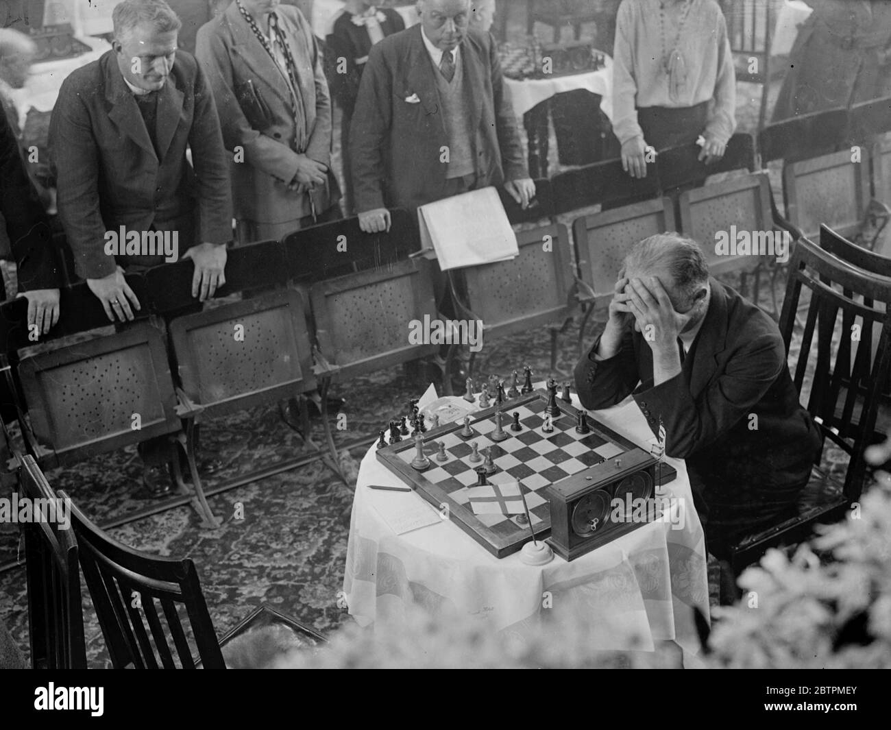 Lost in her game . Chess champions from every part of the world are  competing in the second annual Chess Congress which has opened at the Grand  Hotel , Margate . One