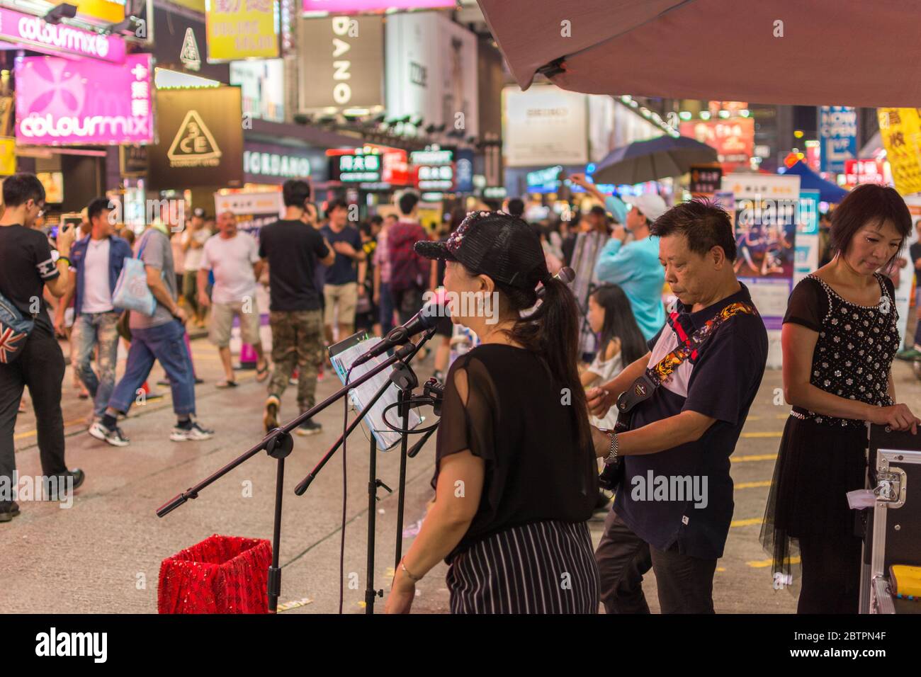 Hong Kong / China - July 26th 2015: Street musicians performing in Kowloon, Hong Kong Stock Photo