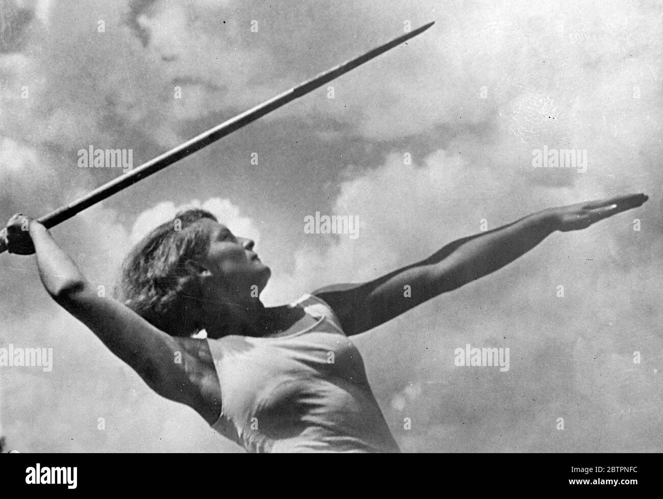 Russian photographic exhibition in London. An exhibition of modern Russian photography has been opened at the Royal photographic Society's headquarters in Russell Square, Bloomsbury, London. M Maisky, Soviet Ambassador, was one of the first visitors. Photo shows, ' lance throwing', by I M Shagin. 17 June 1937 Stock Photo