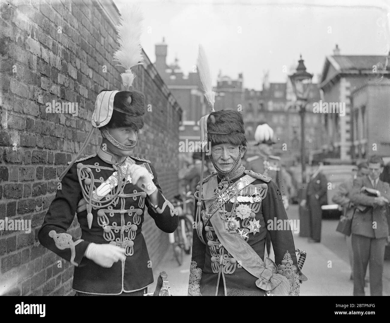 Lord Baden Powell at Levee. Lord Baden Powell, the Chief Scout, attended the levee held by the King at St James's Palace. Photo show, Lord Baden Powell leaving with Colonel Sidney Kennedy after attending the levee. 22 June 1937 Stock Photo