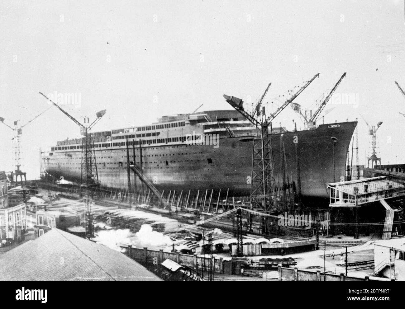 France is liner launched. The new French liner 'Pasteur', built to replace 'L'At'antique' destroyed by fire four years ago, was launched at St Razaire. The vessel will be used on the south American route. 15 February 1938 Stock Photo