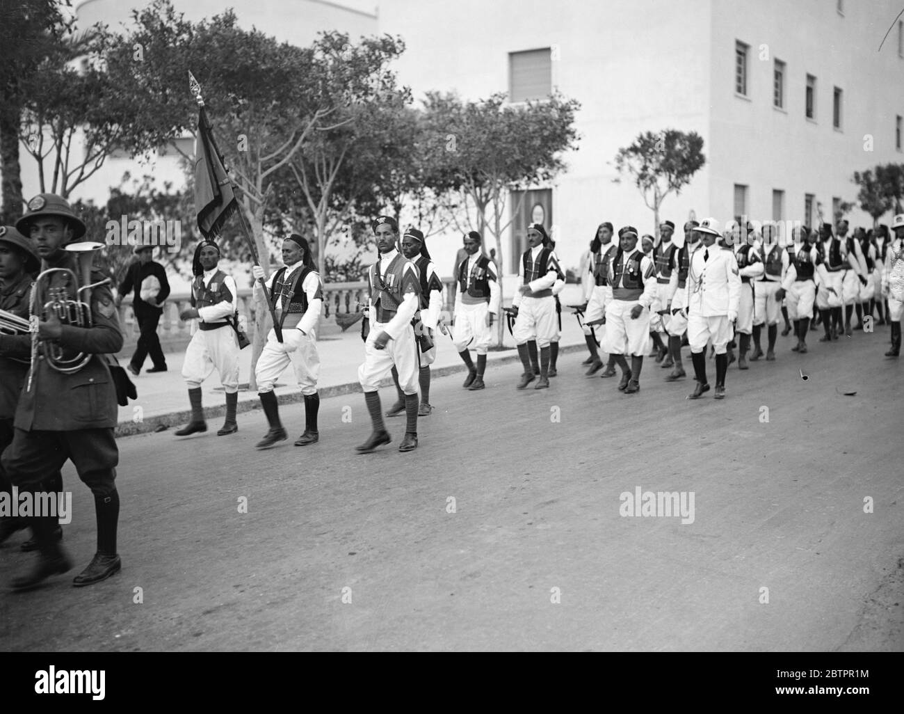 Tripoli. Native troops in traditional uniform marching through Tripoli