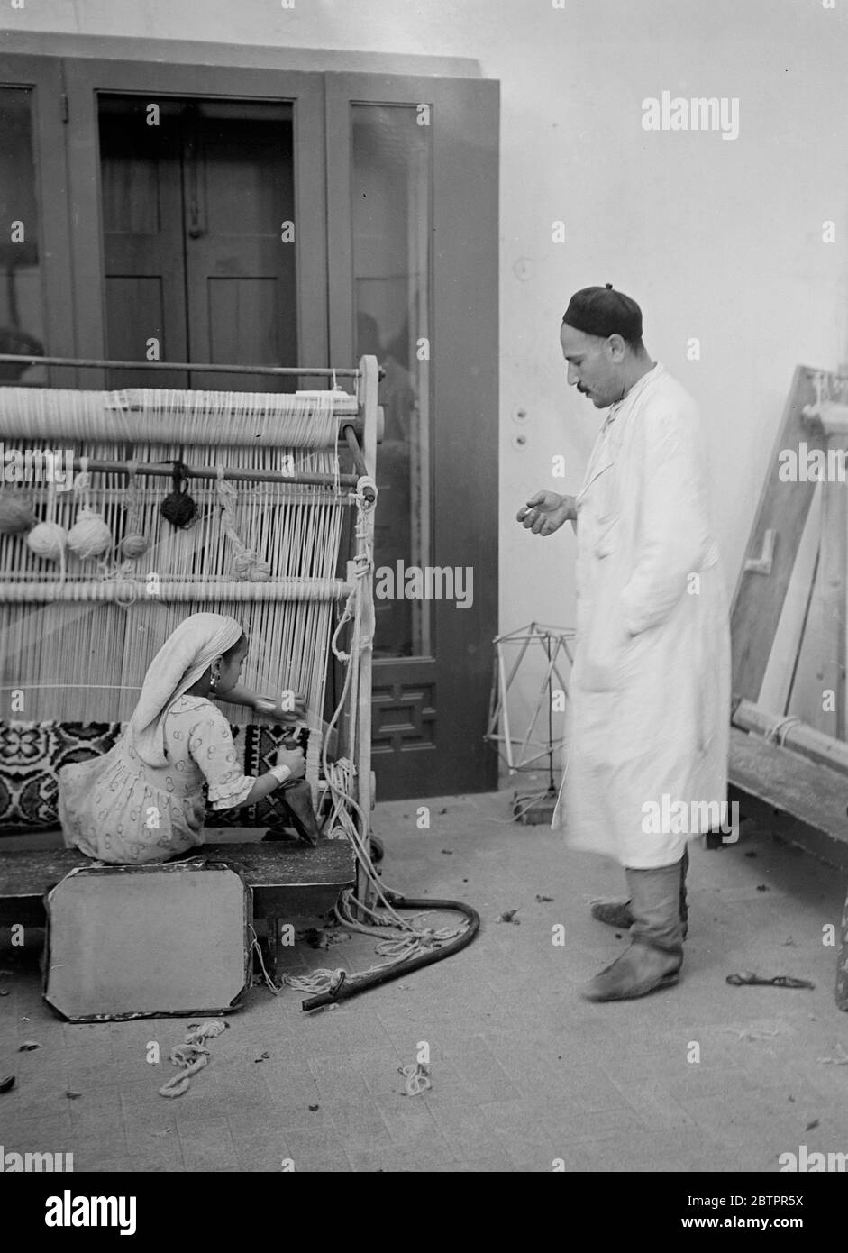 Tripoli. child labour carpet weaving Stock Photo Alamy