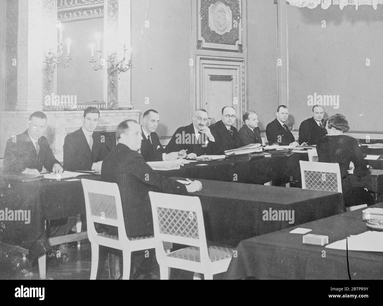 Oslo states meet in Copenhagen. May recognise Italian Abyssinia. It is reported that definite moves by the Oslo States now meeting in conference at Copenhagen, Denmark for the recognition of Italy's conquest of Abyssinia, may be expected soon. The 'Oslo States' are Norway, Sweden, Denmark, Finland, Holland, Belgium and Luxembourg, which cooperates on economic and diplomatic questions. Belgian now supports Holland in favour of such recognition and only Norway is hesitating. Photo shows, the meeting of the Oslo States in Christiansborg Castle, Copenhagen. Left to right, M Baert (Belgium), Baron Stock Photo