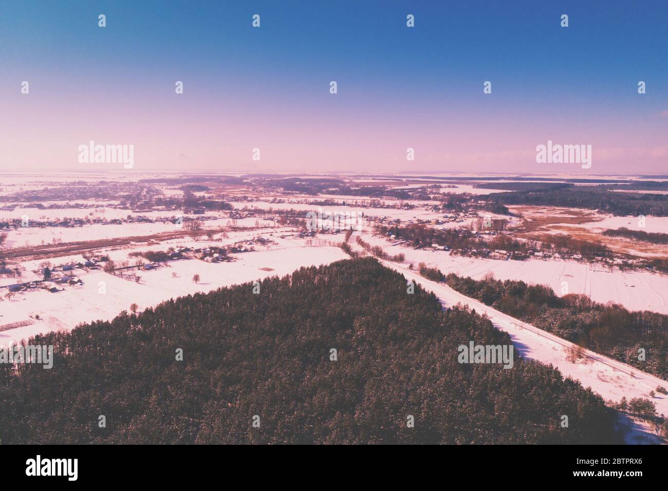 Pine snowy forest in winter. Trees covered with snow. Aerial view ...