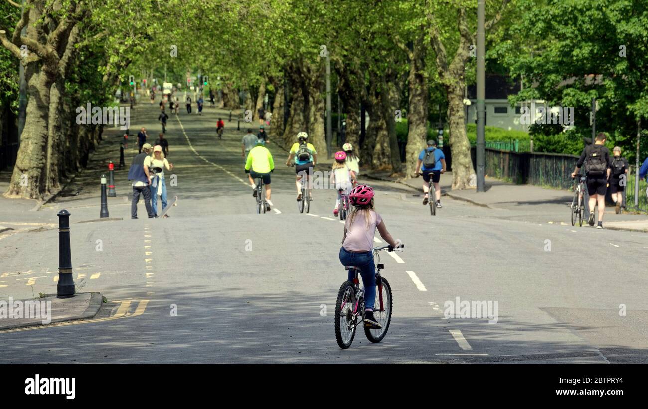 Glasgow, Scotland, UK 27h May, 2020: UK Weather: Kelvingrove park saw kelvin way closed to traffic as it became a thoroughfare for locals enjoying the sun and in the park itself.  Credit: Gerard Ferry/Alamy Live News Stock Photo