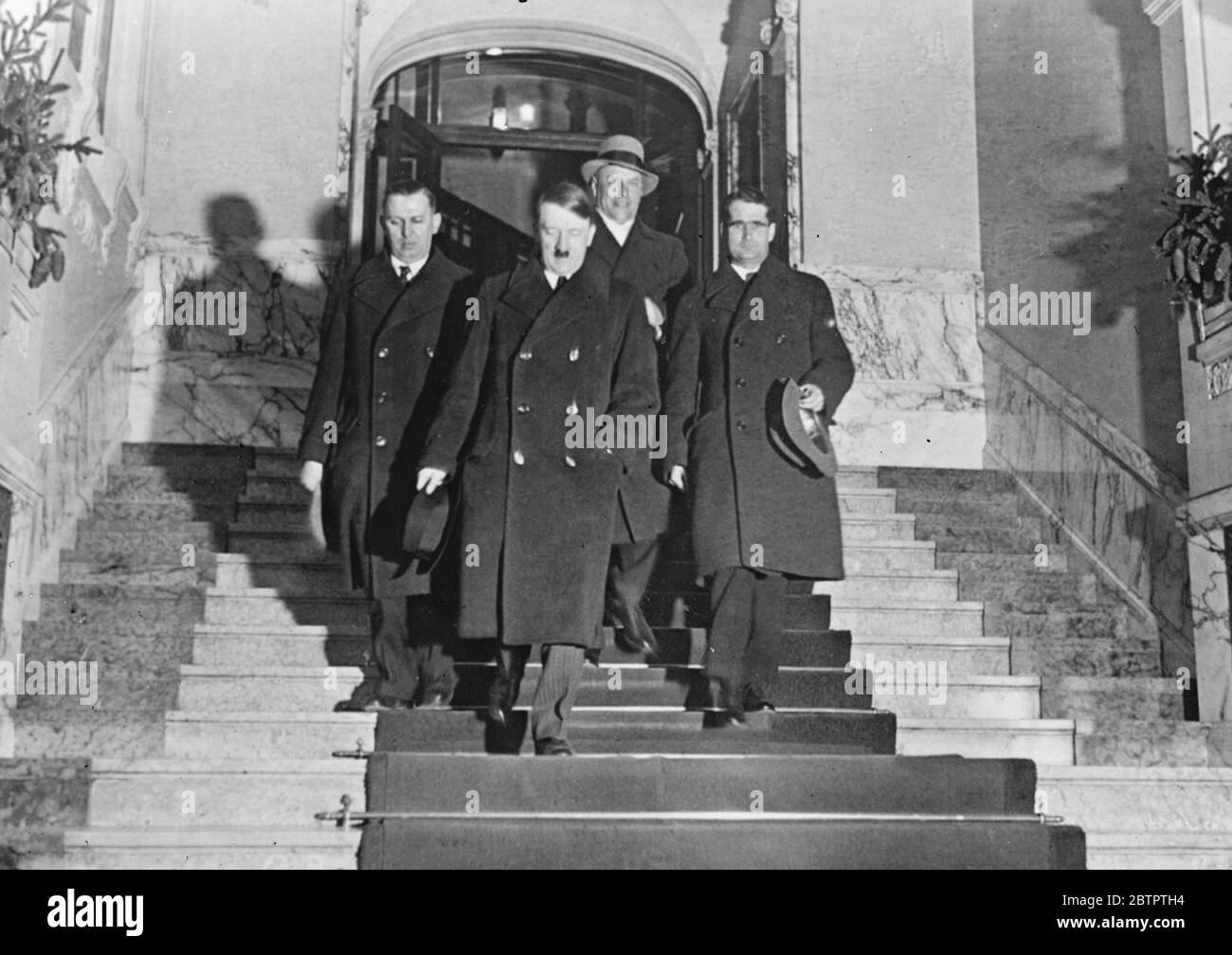 Hitler becomes a German . So that he could stand as a candidate for the German Presidency Adolf Hitler , the German Fascist leader , was made a professor at the University of Brunswick , where he delivered one lecture . He thus became a German citizen automatically . Hitler ( centre ) leaving after his lecture . 28 February 1932 30s, 30's, 1930s, 1930's, thirties, nineteen thirties Stock Photo