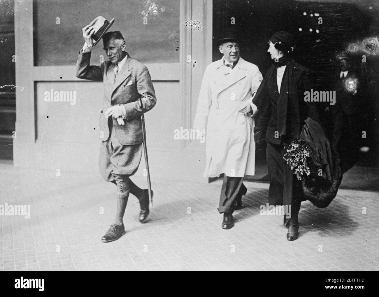 Von Papen in Rome . Vice Chancellor Von Papen of Germany arrived in Rome accompanied by Frau Von Papen . He is having discussions with Italian statesmen . Vice Chancellor Von Papen ( in front ) on arrival in Rome . Behind is Frau Von Papen . 16 April 1934 Stock Photo