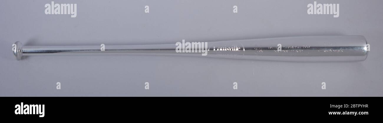 Silver Bat awarded to Tony Gwynn. Silver Bat awarded to Tony Gwynn in 1997. Bat is the shape and size of a standard Major League Baseball (MLB) bat, but is made of sterling silver. Etched at center of bat is the Louisville Slugger logo, with the number 125 above it. Stock Photo
