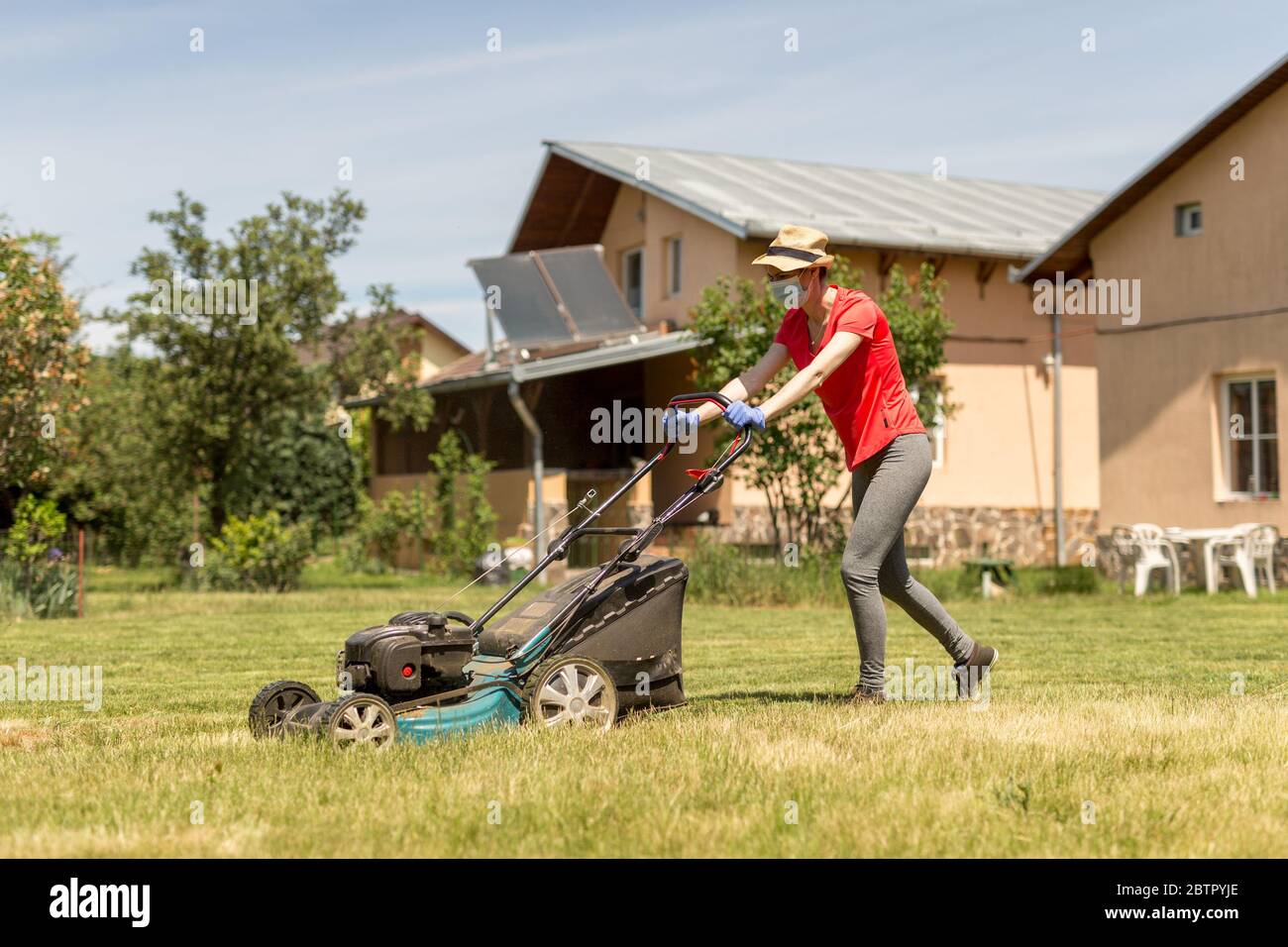 Lawn mowing girl hi-res stock photography and images - Page 7 - Alamy