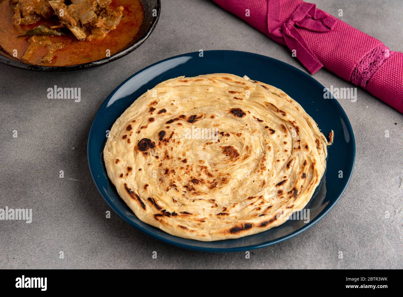 South Indian Flat Bread with Mutton Curry Stock Photo