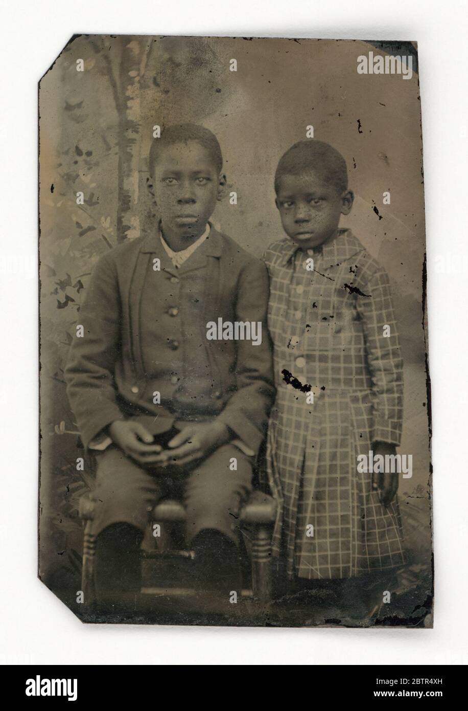 Ambrotype photo of child wearing tartan c. 1860s Ambrotype photo of child wearing tartan c. 1860s
