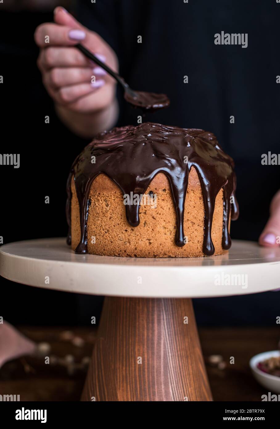 Easter composition with sweet bread, kulich and eggs on light background. Easter holidays breakfast concept. Stock Photo