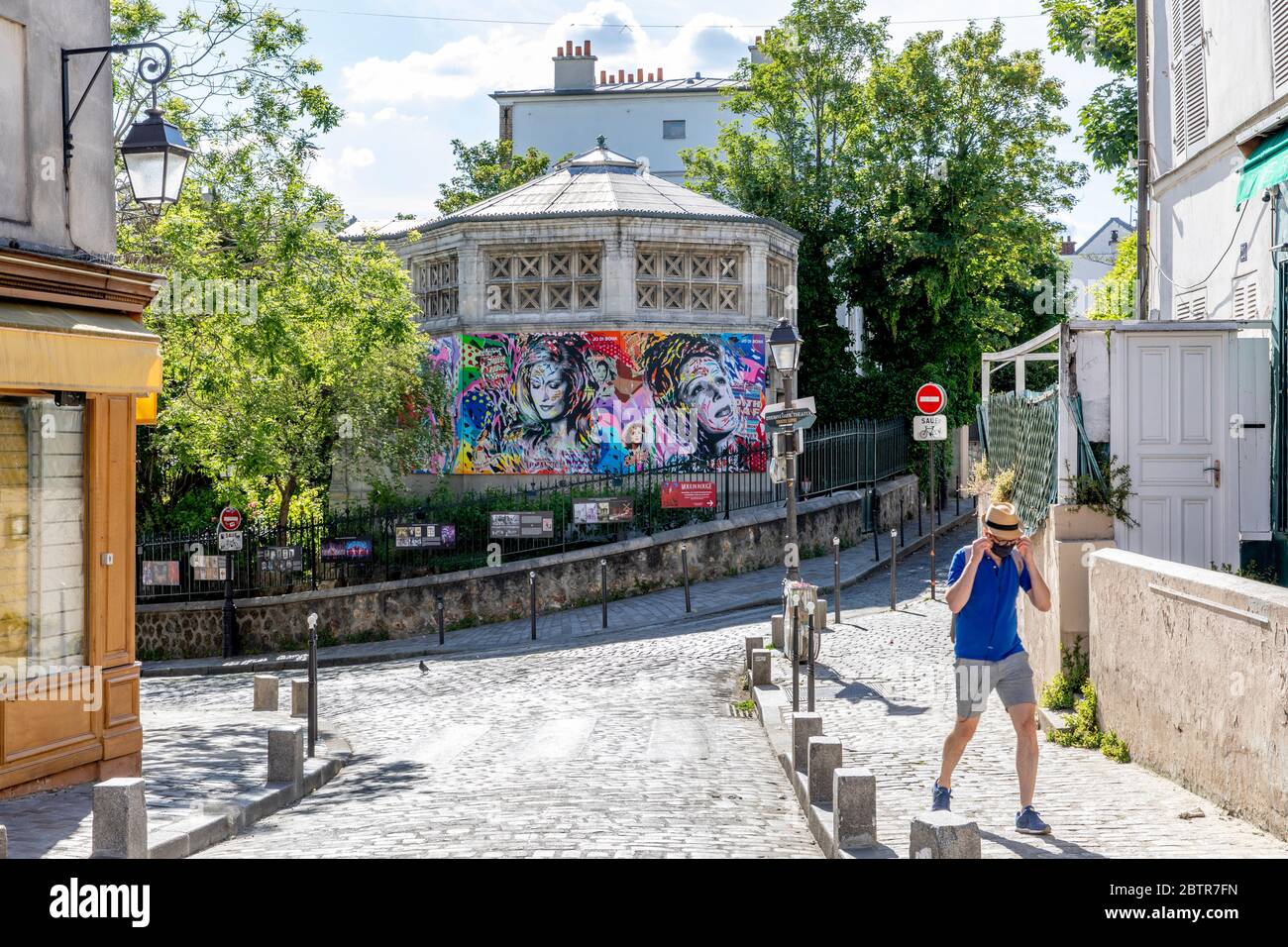 Paris, France - May 20, 2020: Typical street in Montmartre neighborhood in Paris during lockdown because of covid-19 Stock Photo