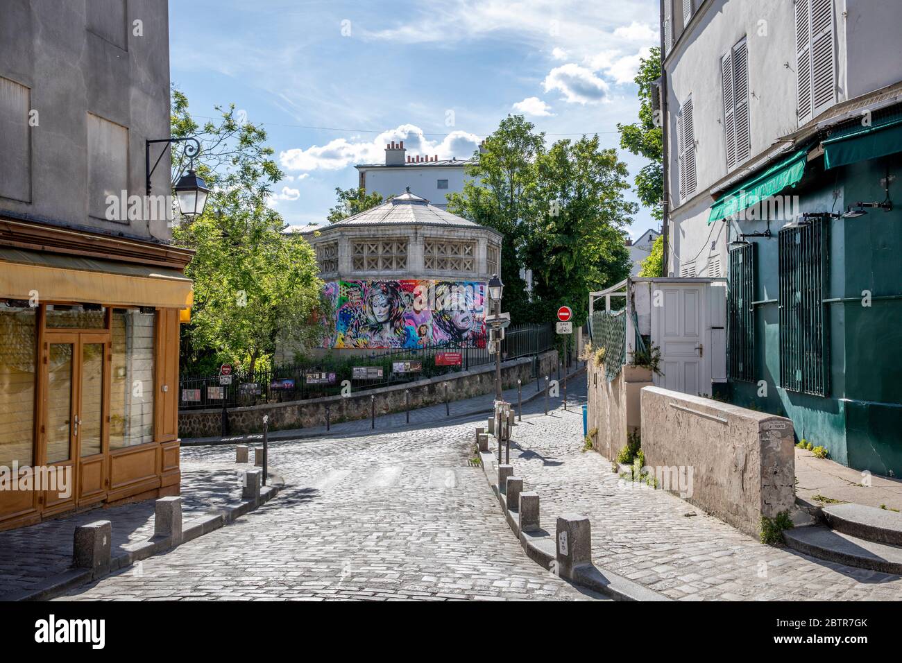 Paris, France - May 20, 2020: Typical street in Montmartre neighborhood in Paris during lockdown because of covid-19 Stock Photo